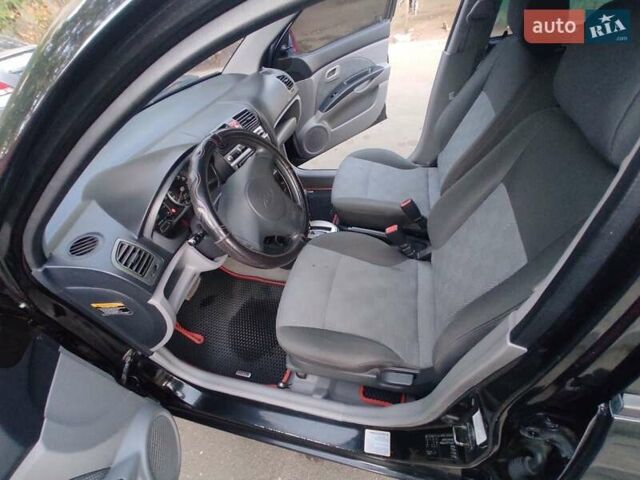 Чорний Кіа Піканто, об'ємом двигуна 1 л та пробігом 138 тис. км за 5499 $, фото 3 на Automoto.ua