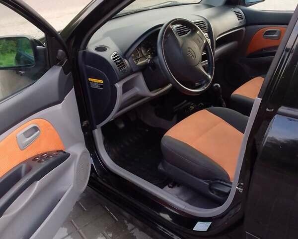 Черный Киа Пиканто, объемом двигателя 1.1 л и пробегом 127 тыс. км за 4700 $, фото 6 на Automoto.ua