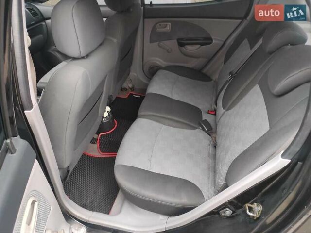 Черный Киа Пиканто, объемом двигателя 1.1 л и пробегом 138 тыс. км за 5099 $, фото 7 на Automoto.ua