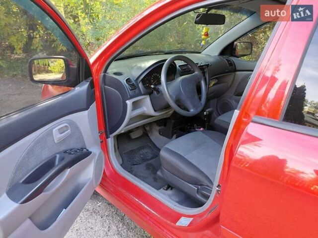 Красный Киа Пиканто, объемом двигателя 1.09 л и пробегом 165 тыс. км за 4150 $, фото 10 на Automoto.ua