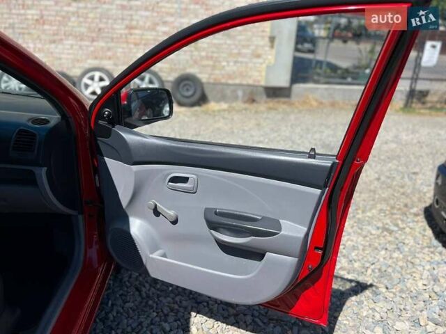 Красный Киа Пиканто, объемом двигателя 1.12 л и пробегом 187 тыс. км за 3599 $, фото 14 на Automoto.ua