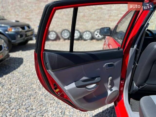 Красный Киа Пиканто, объемом двигателя 1.12 л и пробегом 187 тыс. км за 3599 $, фото 13 на Automoto.ua
