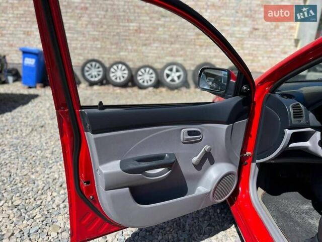 Красный Киа Пиканто, объемом двигателя 1.12 л и пробегом 187 тыс. км за 3599 $, фото 10 на Automoto.ua