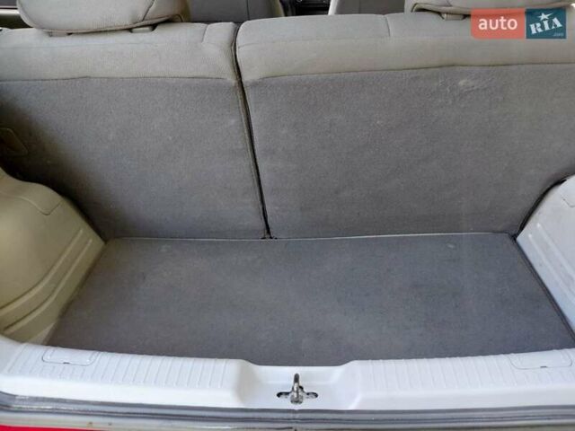 Красный Киа Пиканто, объемом двигателя 1.09 л и пробегом 165 тыс. км за 4150 $, фото 4 на Automoto.ua