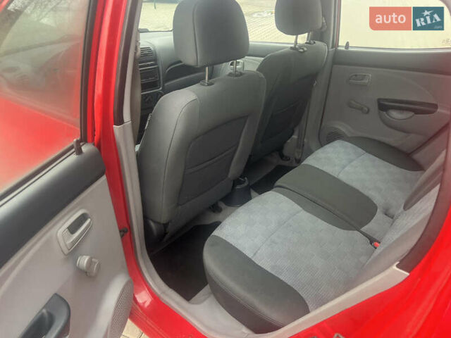 Червоний Кіа Піканто, об'ємом двигуна 1.09 л та пробігом 122 тис. км за 3800 $, фото 7 на Automoto.ua