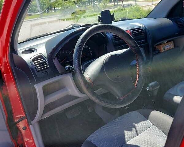 Красный Киа Пиканто, объемом двигателя 1.09 л и пробегом 152 тыс. км за 4300 $, фото 9 на Automoto.ua
