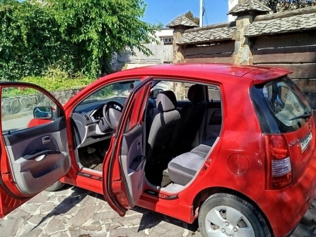 Красный Киа Пиканто, объемом двигателя 1.1 л и пробегом 117 тыс. км за 5300 $, фото 3 на Automoto.ua