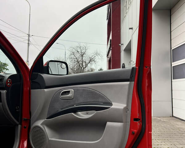 Красный Киа Пиканто, объемом двигателя 1.1 л и пробегом 119 тыс. км за 4999 $, фото 9 на Automoto.ua