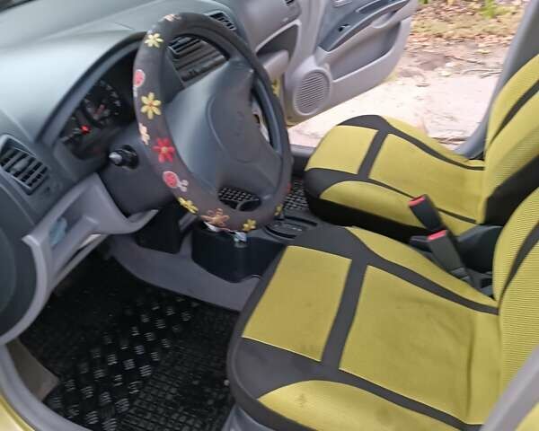 Жовтий Кіа Піканто, об'ємом двигуна 1.09 л та пробігом 134 тис. км за 4700 $, фото 5 на Automoto.ua