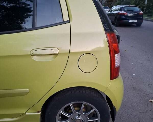 Жовтий Кіа Піканто, об'ємом двигуна 1.09 л та пробігом 134 тис. км за 4700 $, фото 2 на Automoto.ua