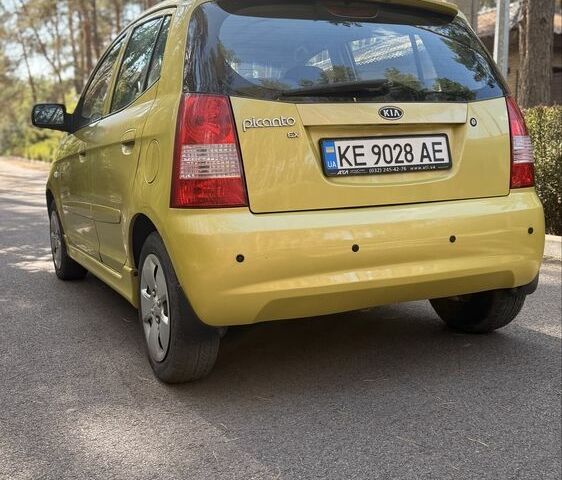 Жовтий Кіа Піканто, об'ємом двигуна 1.1 л та пробігом 153 тис. км за 4800 $, фото 5 на Automoto.ua