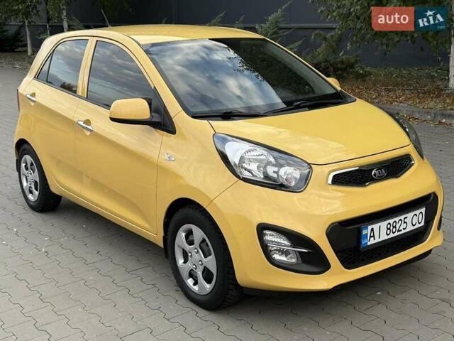 Желтый Киа Пиканто, объемом двигателя 1.25 л и пробегом 75 тыс. км за 9700 $, фото 2 на Automoto.ua