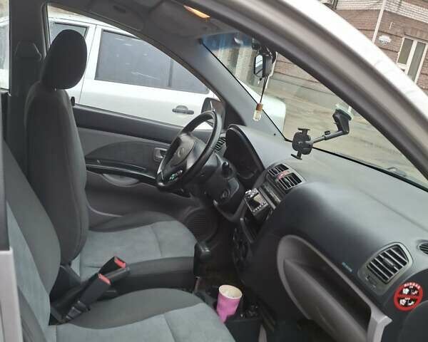 Серый Киа Пиканто, объемом двигателя 1.09 л и пробегом 92 тыс. км за 4550 $, фото 4 на Automoto.ua