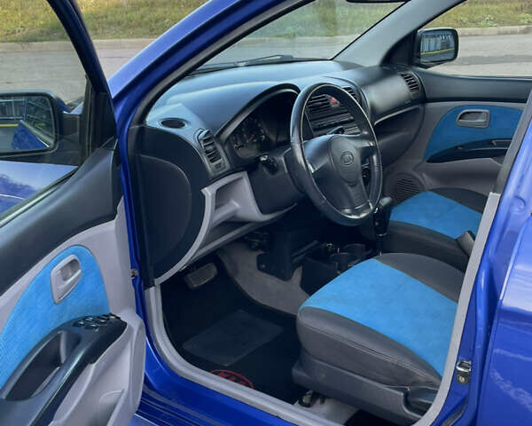 Синий Киа Пиканто, объемом двигателя 1.09 л и пробегом 190 тыс. км за 4800 $, фото 6 на Automoto.ua