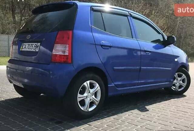 Синий Киа Пиканто, объемом двигателя 1.1 л и пробегом 166 тыс. км за 4600 $, фото 2 на Automoto.ua