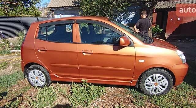 Помаранчевий Кіа Піканто, об'ємом двигуна 1 л та пробігом 190 тис. км за 4000 $, фото 3 на Automoto.ua