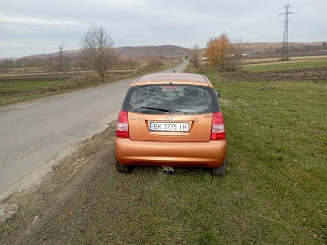 Помаранчевий Кіа Піканто, об'ємом двигуна 1.1 л та пробігом 150 тис. км за 4100 $, фото 3 на Automoto.ua