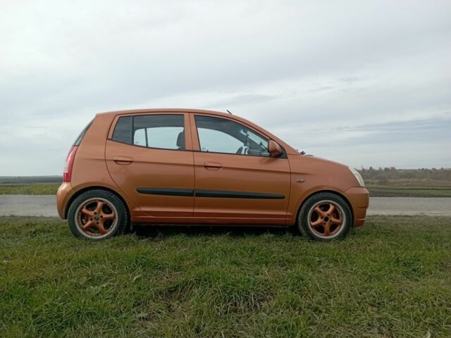 Помаранчевий Кіа Піканто, об'ємом двигуна 1.1 л та пробігом 150 тис. км за 4100 $, фото 2 на Automoto.ua