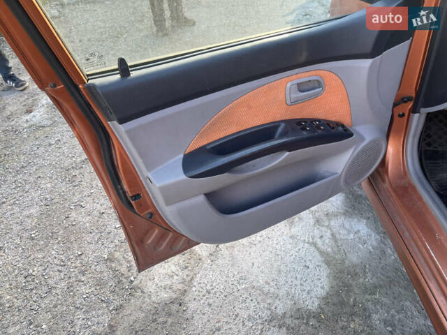 Помаранчевий Кіа Піканто, об'ємом двигуна 1.1 л та пробігом 240 тис. км за 1500 $, фото 8 на Automoto.ua