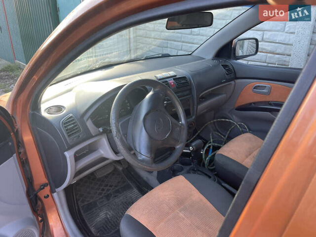 Помаранчевий Кіа Піканто, об'ємом двигуна 1.1 л та пробігом 240 тис. км за 1500 $, фото 4 на Automoto.ua