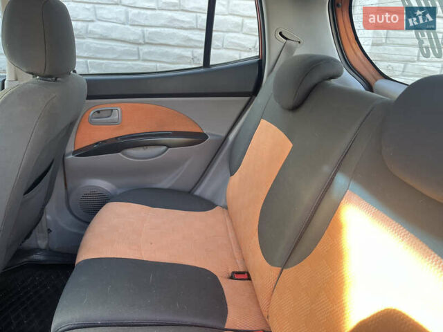 Помаранчевий Кіа Піканто, об'ємом двигуна 1.1 л та пробігом 240 тис. км за 1500 $, фото 7 на Automoto.ua
