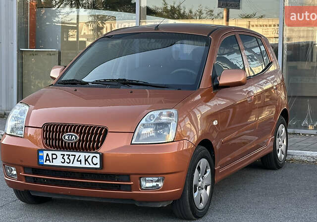 Помаранчевий Кіа Піканто, об'ємом двигуна 1.1 л та пробігом 173 тис. км за 5300 $, фото 7 на Automoto.ua