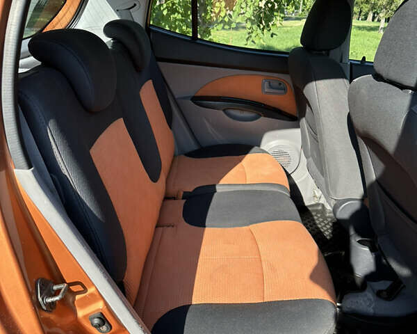 Оранжевый Киа Пиканто, объемом двигателя 1.09 л и пробегом 69 тыс. км за 5350 $, фото 5 на Automoto.ua