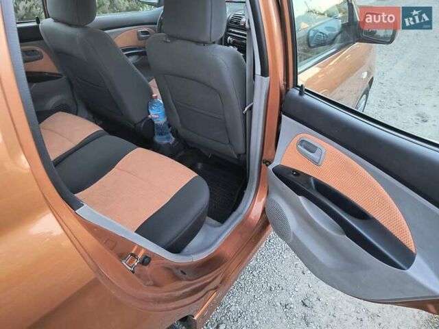 Помаранчевий Кіа Піканто, об'ємом двигуна 1.1 л та пробігом 75 тис. км за 5500 $, фото 5 на Automoto.ua