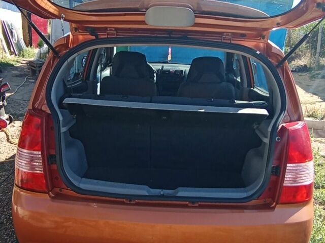 Оранжевый Киа Пиканто, объемом двигателя 1 л и пробегом 190 тыс. км за 3900 $, фото 4 на Automoto.ua