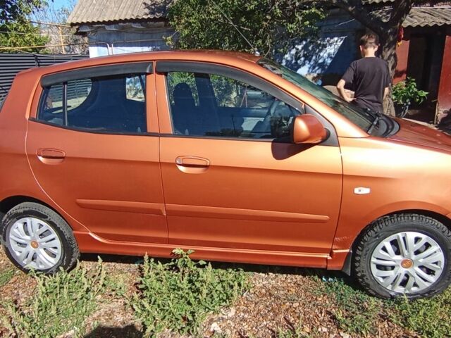 Оранжевый Киа Пиканто, объемом двигателя 1 л и пробегом 190 тыс. км за 3900 $, фото 2 на Automoto.ua