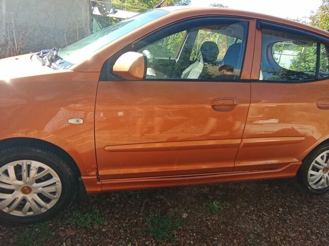 Оранжевый Киа Пиканто, объемом двигателя 1 л и пробегом 190 тыс. км за 3900 $, фото 1 на Automoto.ua