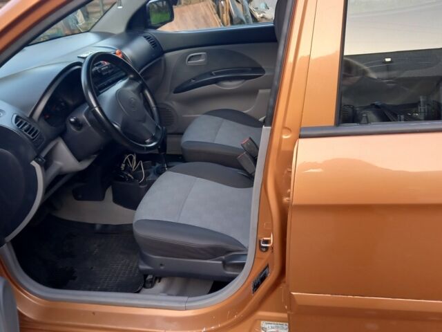 Оранжевый Киа Пиканто, объемом двигателя 1 л и пробегом 175 тыс. км за 4600 $, фото 1 на Automoto.ua