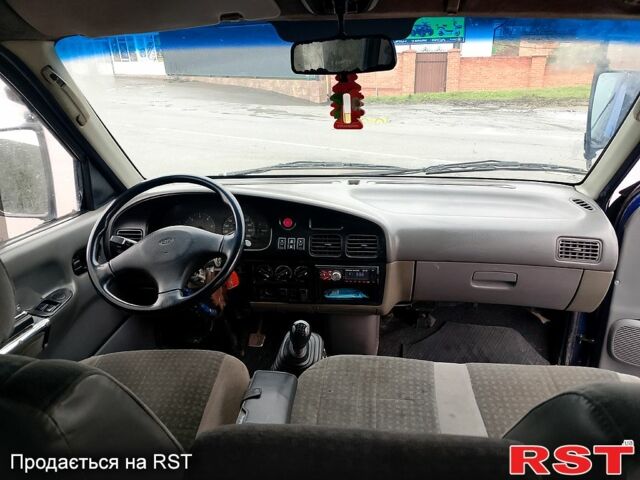 Синій Кіа Преджіо, об'ємом двигуна 2.7 л та пробігом 623 тис. км за 1650 $, фото 6 на Automoto.ua