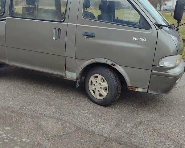 Зелений Кіа Преджіо, об'ємом двигуна 2.7 л та пробігом 300 тис. км за 2700 $, фото 5 на Automoto.ua