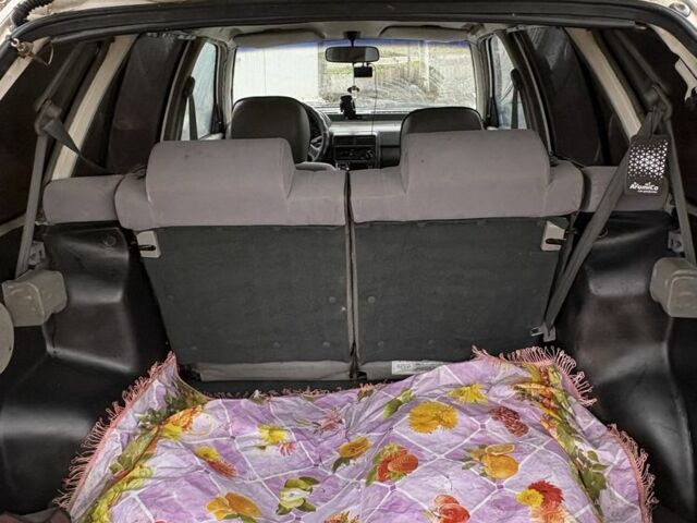 Белый Киа Прайд, объемом двигателя 1.3 л и пробегом 260 тыс. км за 950 $, фото 5 на Automoto.ua