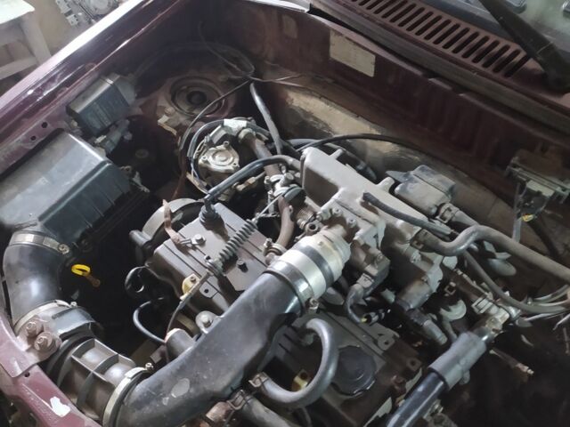 Красный Киа Прайд, объемом двигателя 1.3 л и пробегом 238 тыс. км за 1300 $, фото 5 на Automoto.ua