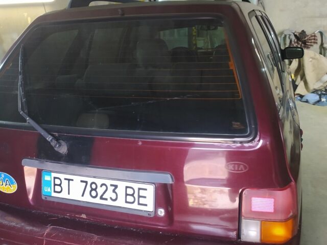 Красный Киа Прайд, объемом двигателя 1.3 л и пробегом 238 тыс. км за 1300 $, фото 2 на Automoto.ua