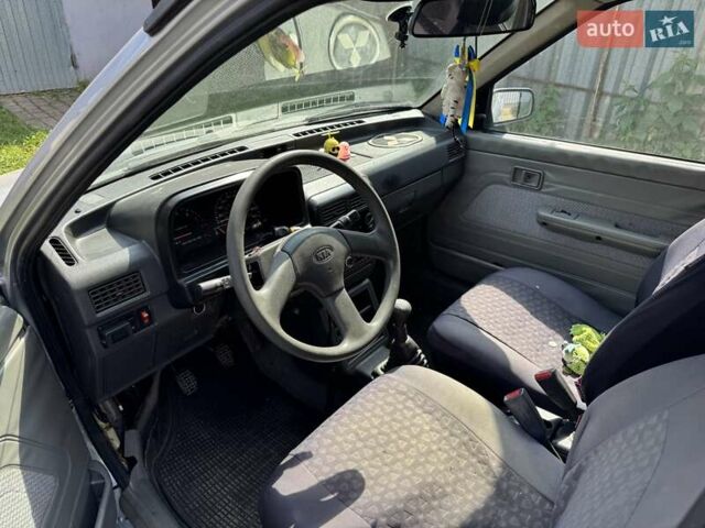 Серый Киа Прайд, объемом двигателя 1.3 л и пробегом 266 тыс. км за 600 $, фото 3 на Automoto.ua