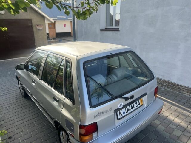 Сірий Кіа Прайд, об'ємом двигуна 1.3 л та пробігом 243 тис. км за 1600 $, фото 7 на Automoto.ua