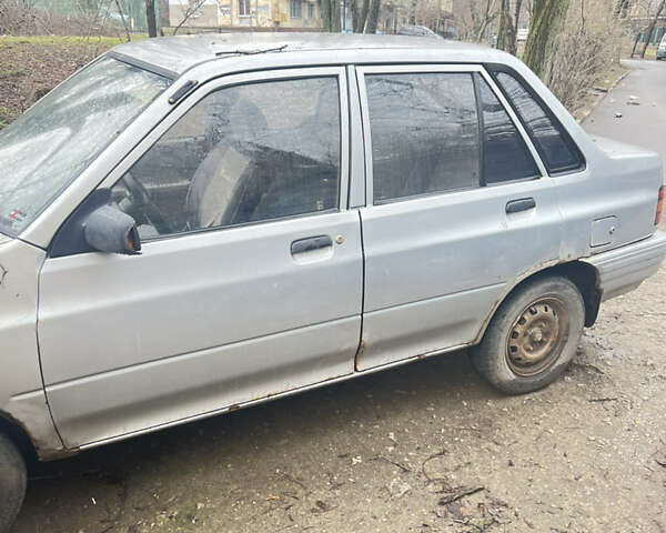 Серый Киа Прайд, объемом двигателя 1.3 л и пробегом 200 тыс. км за 550 $, фото 1 на Automoto.ua