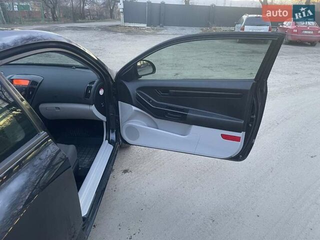 Чорний Кіа Про Сід, об'ємом двигуна 1.4 л та пробігом 177 тис. км за 5600 $, фото 2 на Automoto.ua