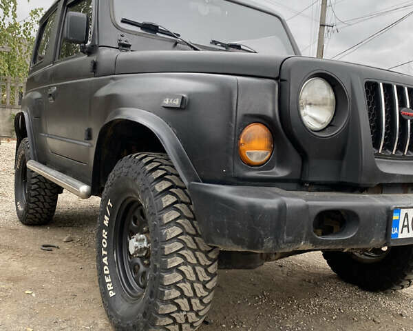 Черный Киа Ретона, объемом двигателя 2 л и пробегом 80 тыс. км за 6500 $, фото 5 на Automoto.ua