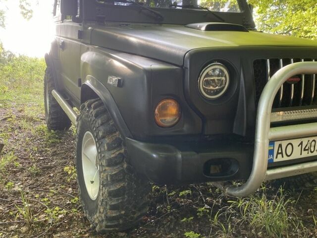 Чорний Кіа Ретона, об'ємом двигуна 2 л та пробігом 150 тис. км за 7500 $, фото 1 на Automoto.ua