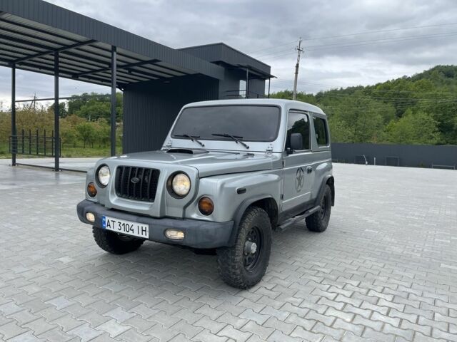 Серый Киа Ретона, объемом двигателя 2 л и пробегом 100 тыс. км за 5500 $, фото 9 на Automoto.ua