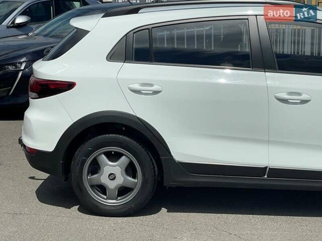Білий Кіа Rio X-Line, об'ємом двигуна 1.6 л та пробігом 99 тис. км за 12600 $, фото 13 на Automoto.ua