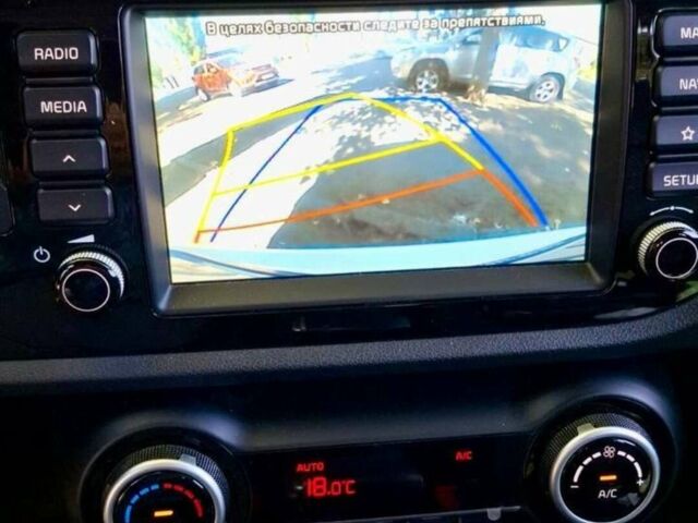 Білий Кіа Rio X-Line, об'ємом двигуна 1.6 л та пробігом 68 тис. км за 18500 $, фото 9 на Automoto.ua