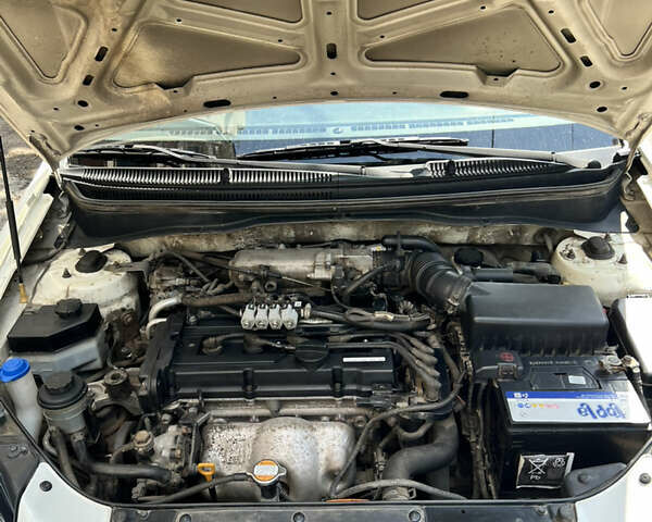 Білий Кіа Ріо, об'ємом двигуна 1.4 л та пробігом 121 тис. км за 4850 $, фото 11 на Automoto.ua