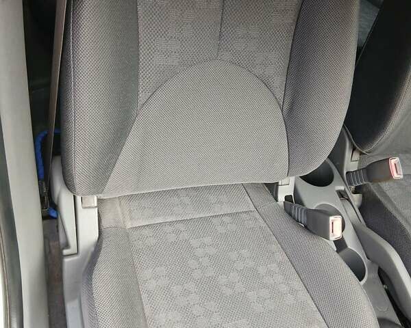 Білий Кіа Ріо, об'ємом двигуна 1.4 л та пробігом 148 тис. км за 4600 $, фото 10 на Automoto.ua