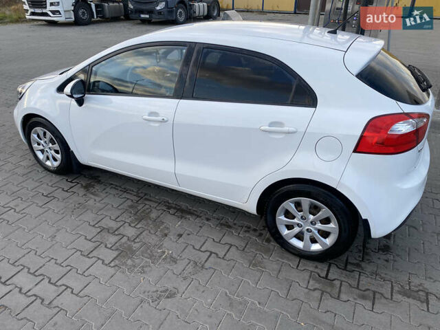 Білий Кіа Ріо, об'ємом двигуна 1.1 л та пробігом 204 тис. км за 6800 $, фото 13 на Automoto.ua