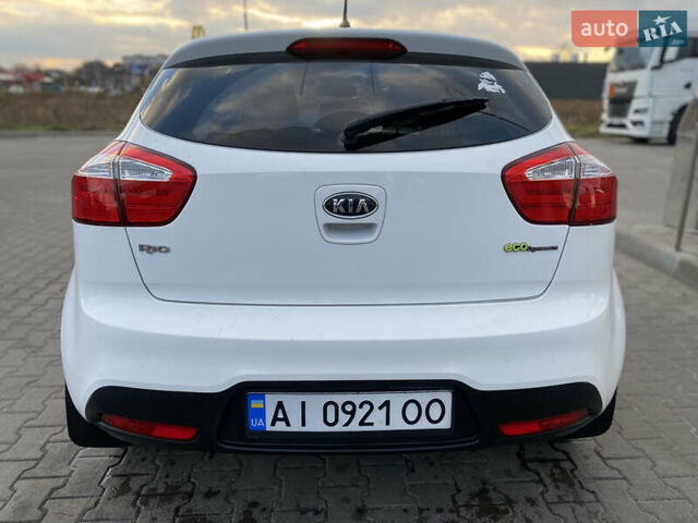 Білий Кіа Ріо, об'ємом двигуна 1.1 л та пробігом 204 тис. км за 6800 $, фото 4 на Automoto.ua